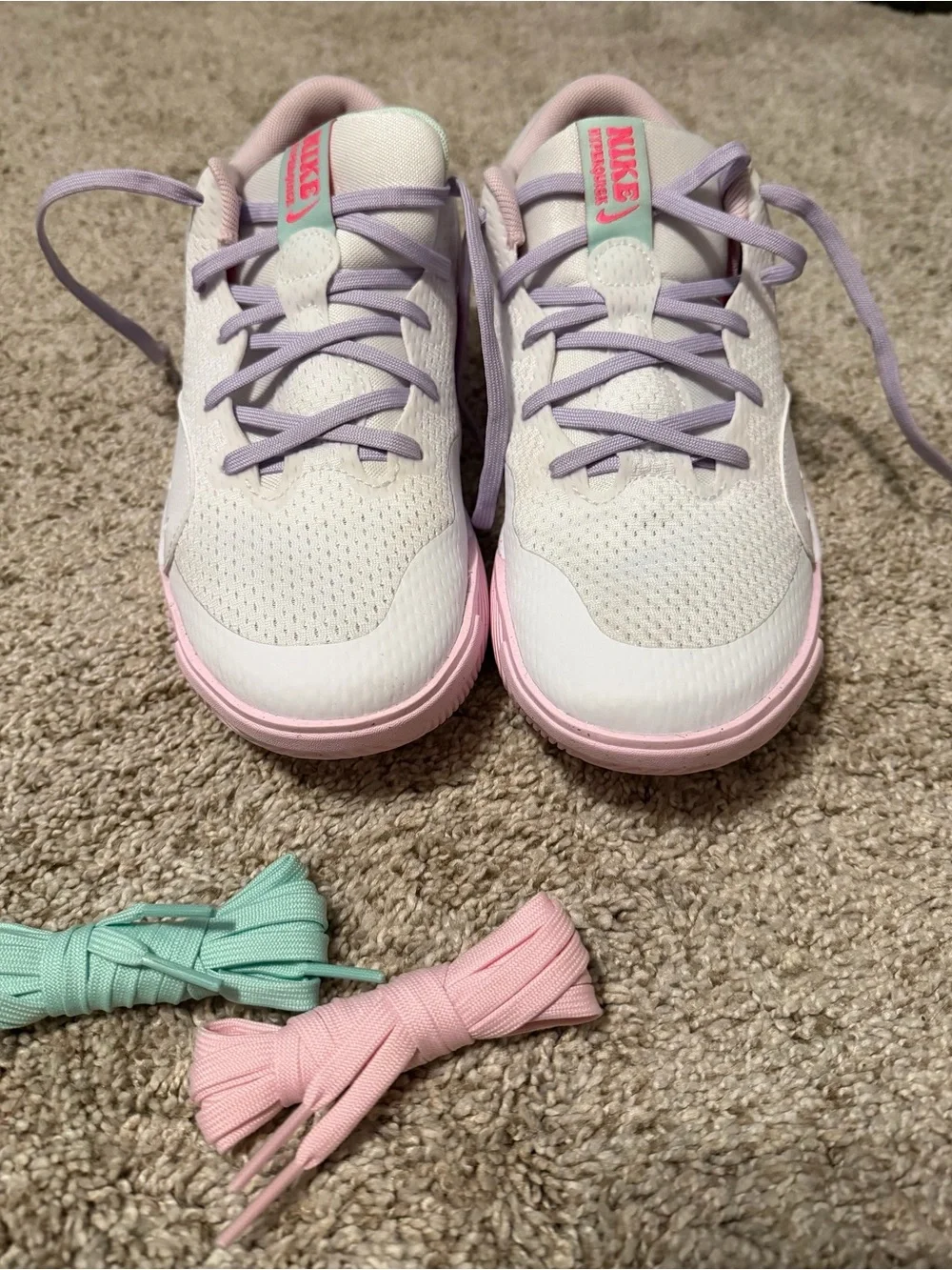 Nike White Sneakers with Pink Midsoles and Lavender Laces